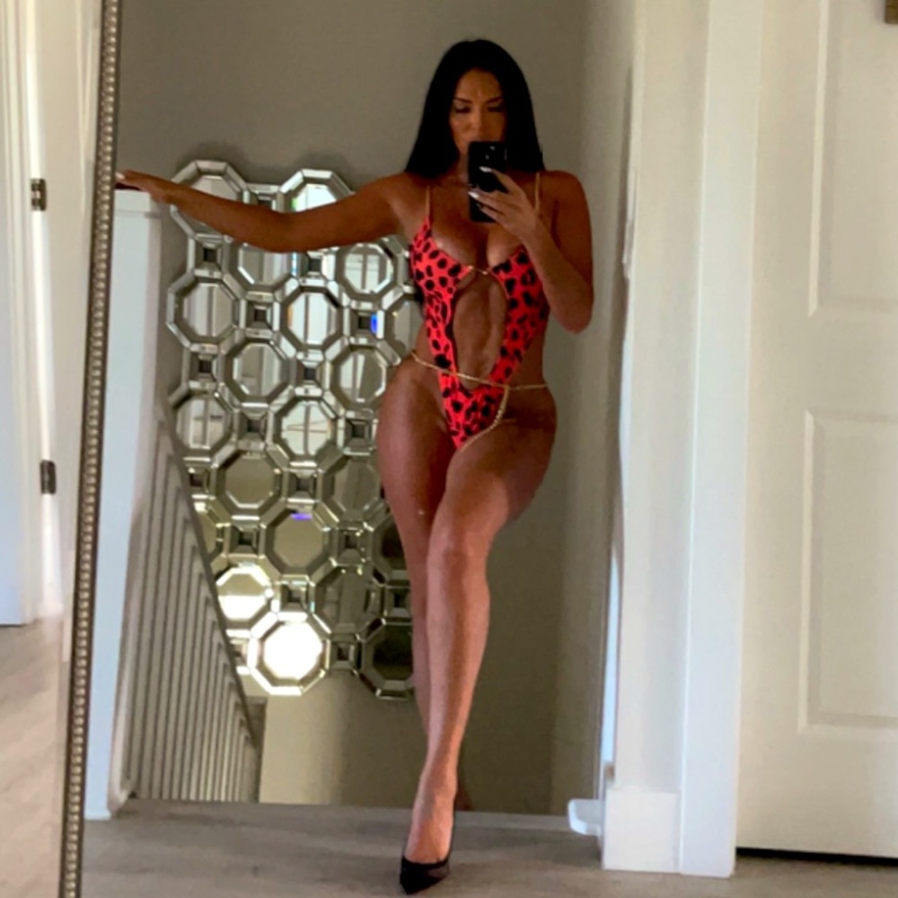 Story1440 One Piece Animal Print Chain Swimsuit worn once. Size M